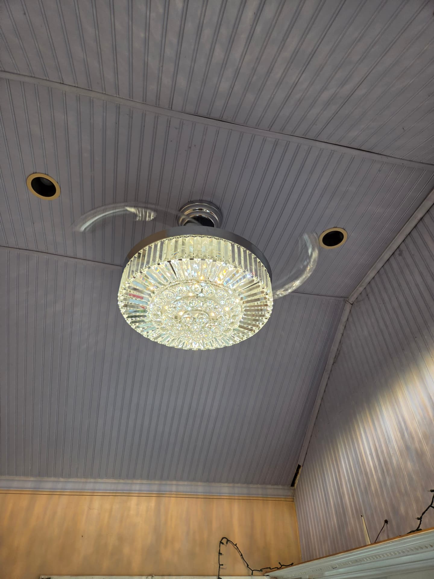Crystal ceiling fixture with recessed lighting installed