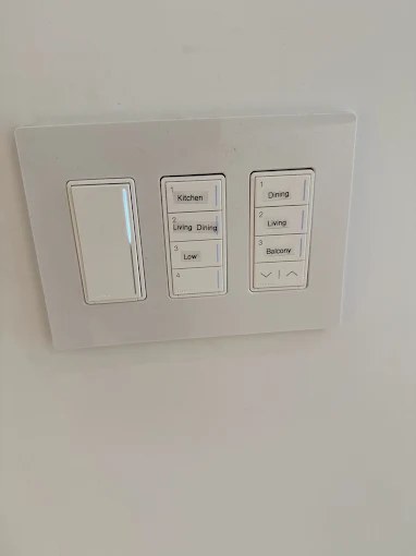 Lutron lighting control keypads installed for whole-home scenes