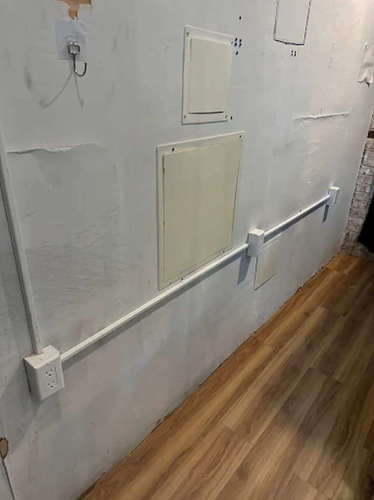 Surface raceway with new outlets installed along a wall