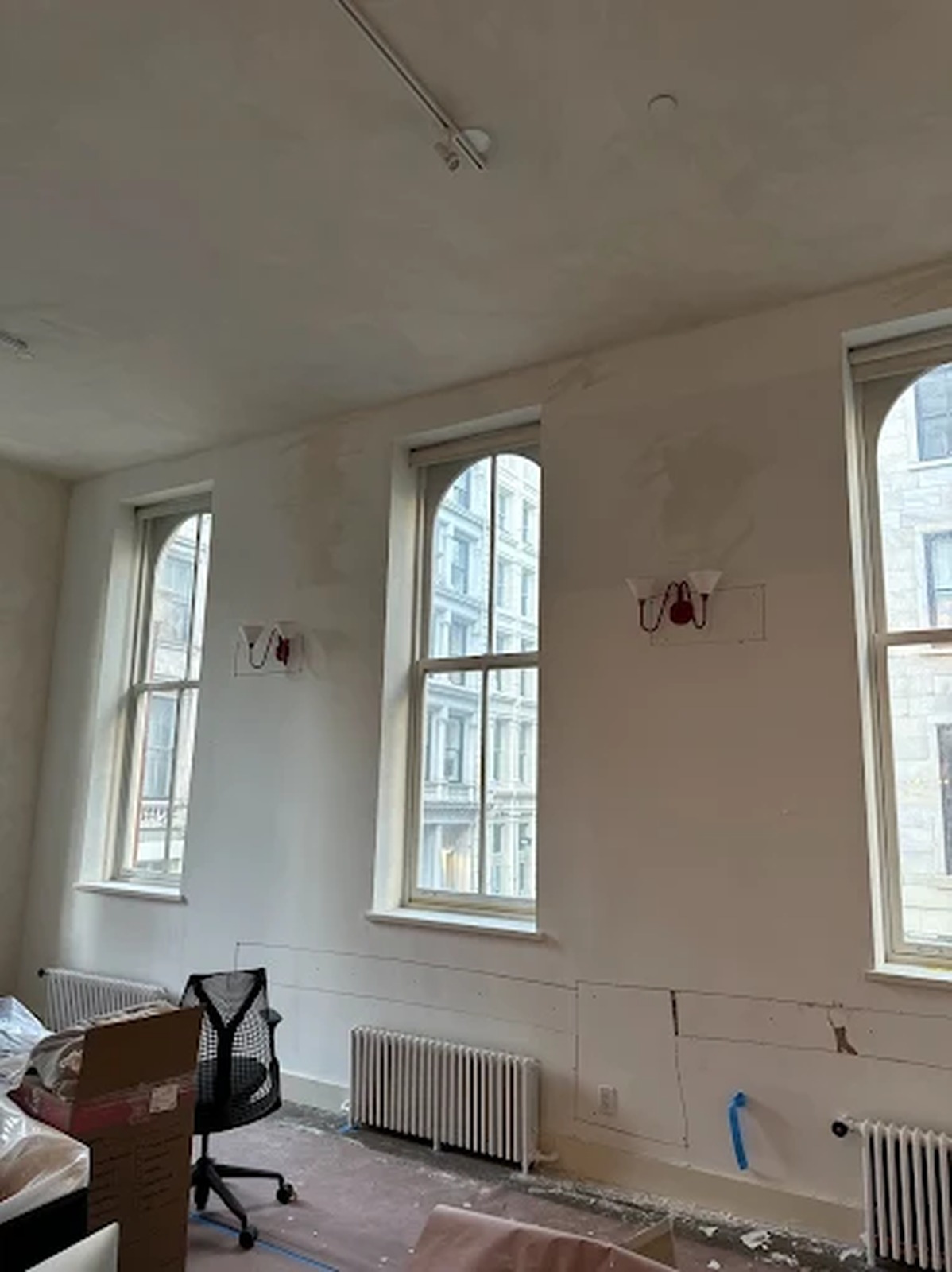 Wall sconce rough-in wiring in a landmark loft renovation