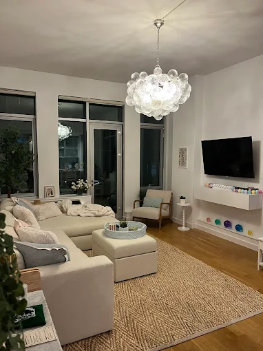 Bubble glass chandelier installed in a modern living room