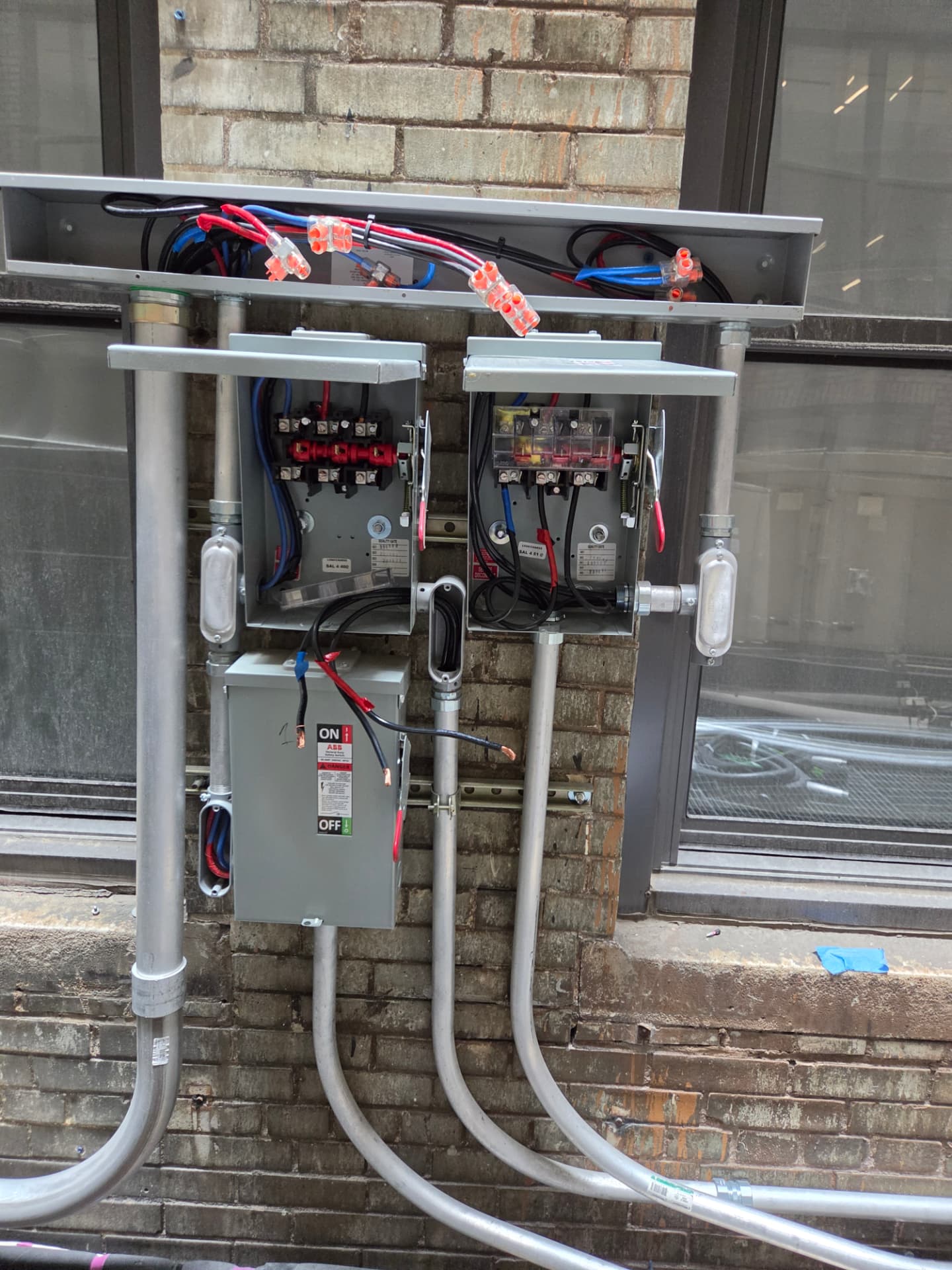 Exterior disconnect switches and conduit runs for HVAC equipment