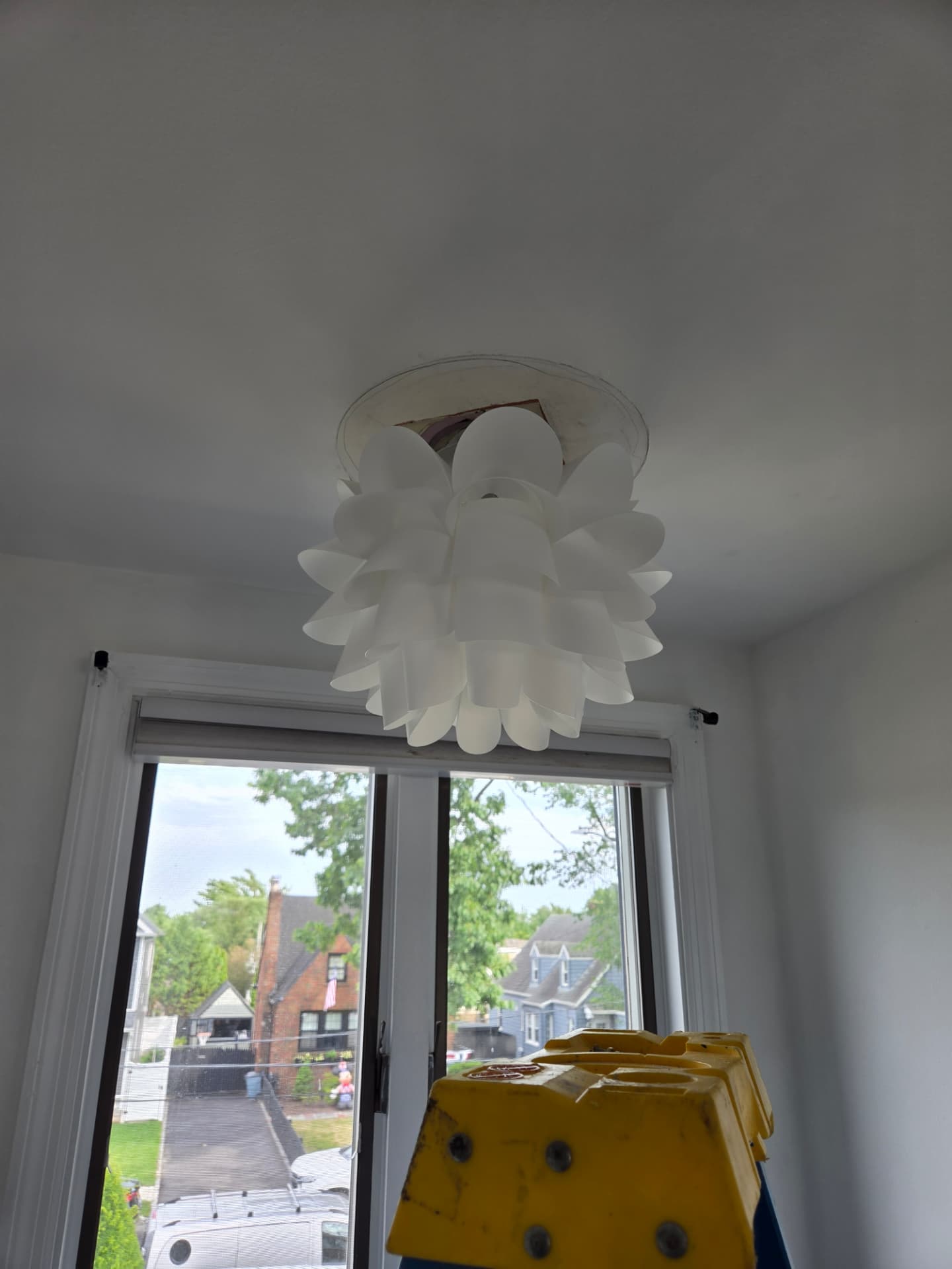 New flush-mount ceiling light fixture installation