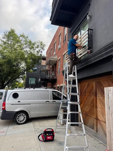 Exterior lighting and camera work on a Brooklyn townhouse