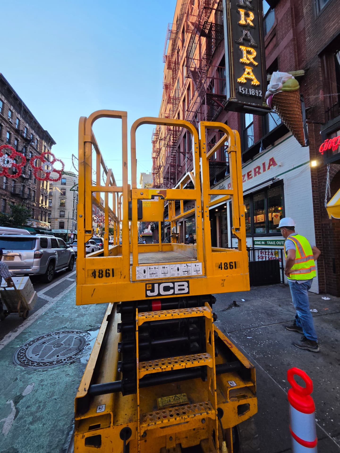 Power Electric NY commercial electrical crew working from a lift in Manhattan
