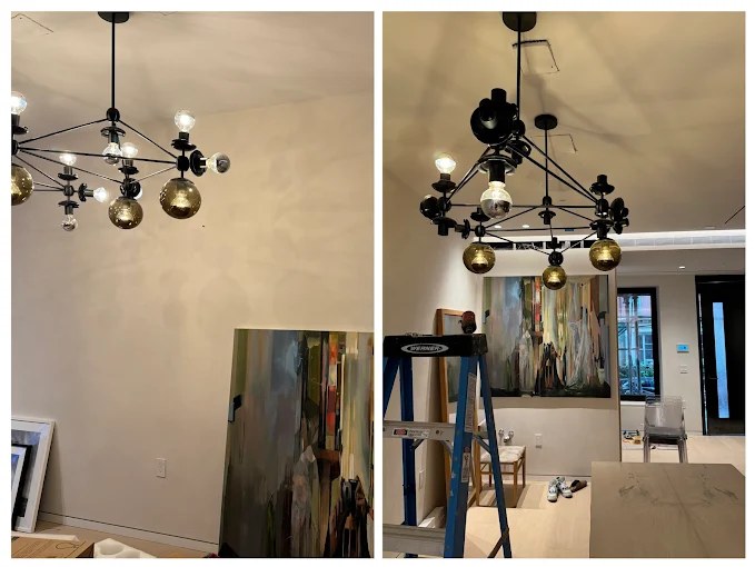 Modern globe chandelier installed over a dining area