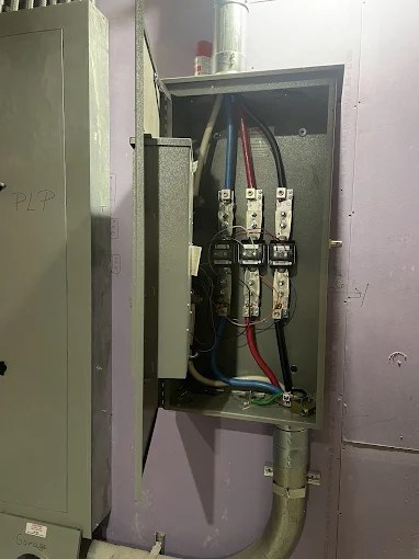Commercial fused service switch wired in a mechanical room