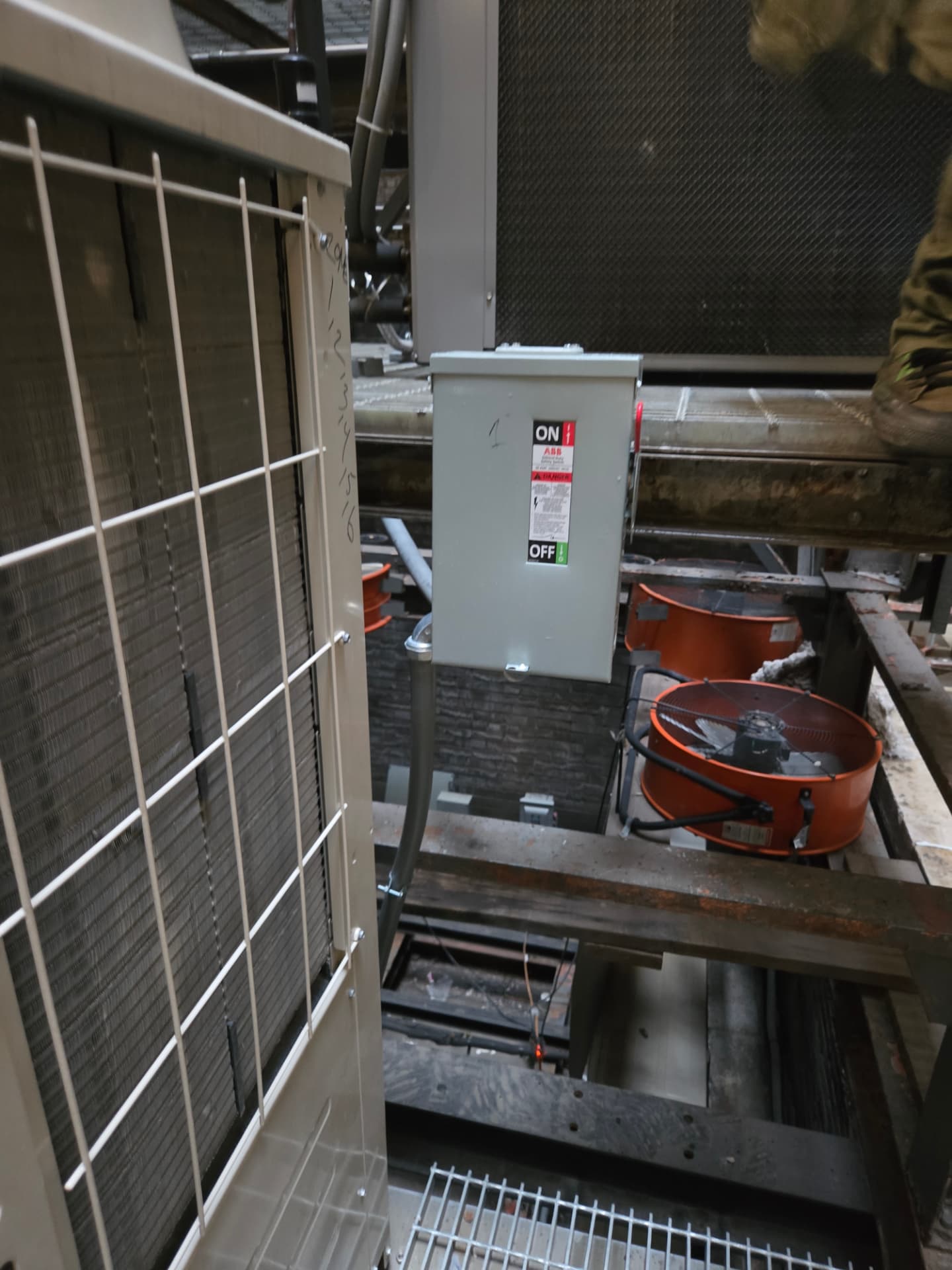 Rooftop HVAC power feed and disconnect installation