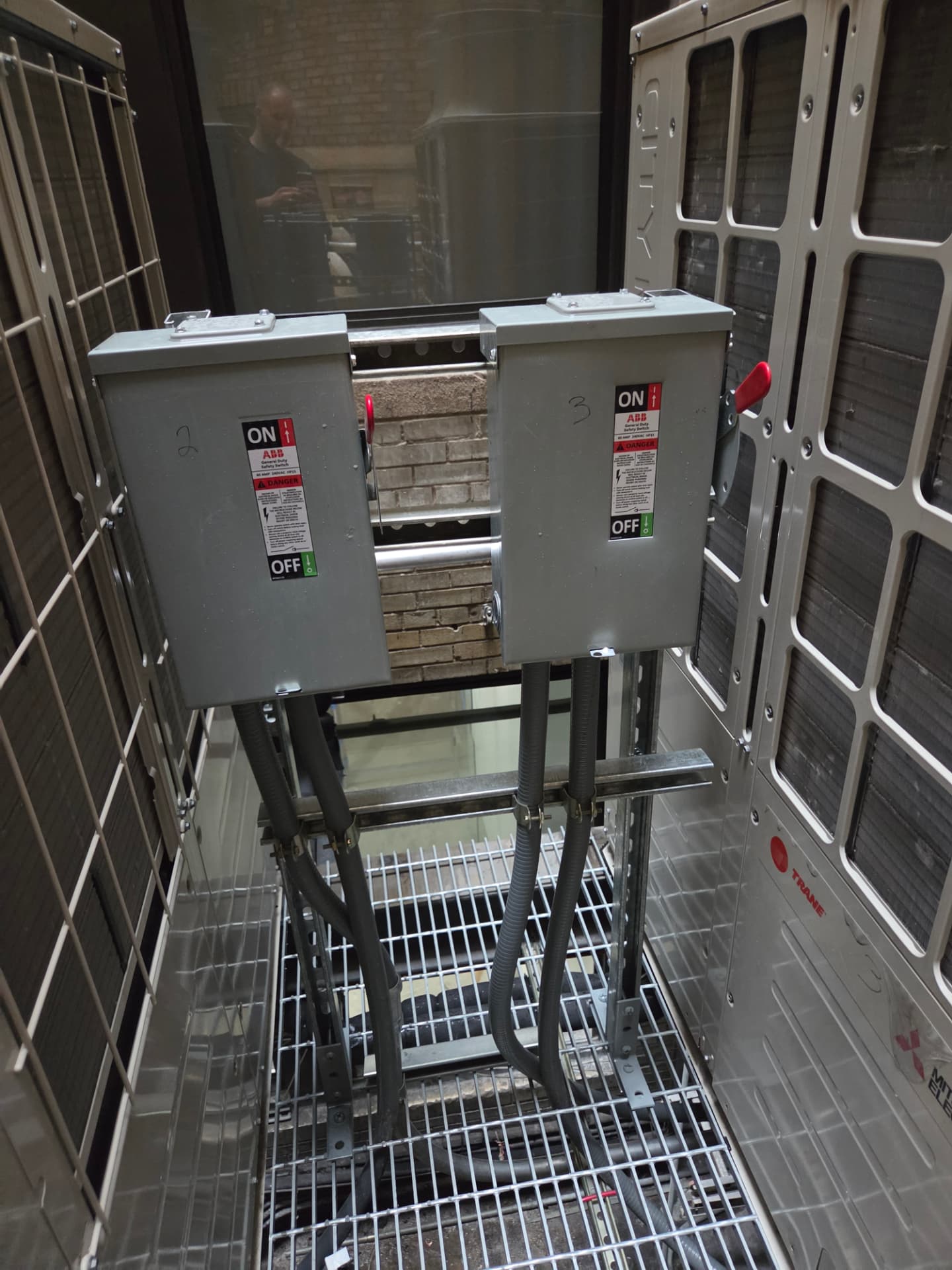 Safety disconnect switches wired for rooftop condenser units