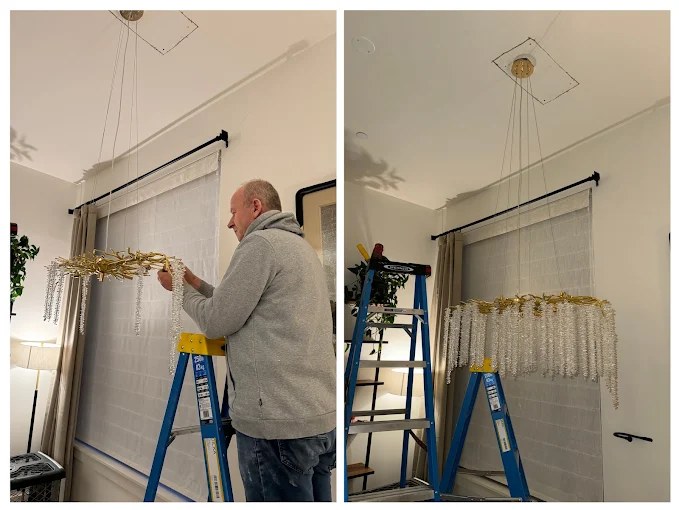 Crystal linear chandelier assembled and hung in a dining room