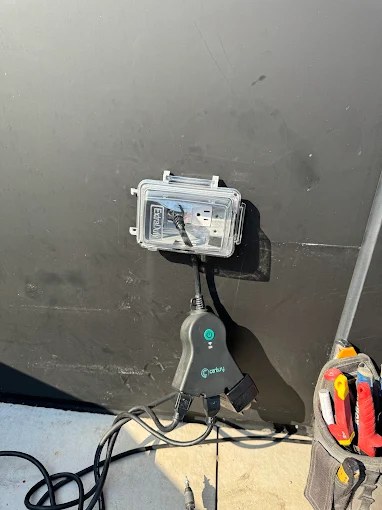 Weatherproof outdoor GFCI outlet with in-use cover installed