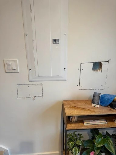 Panel relocation rough-in with new circuits in an apartment